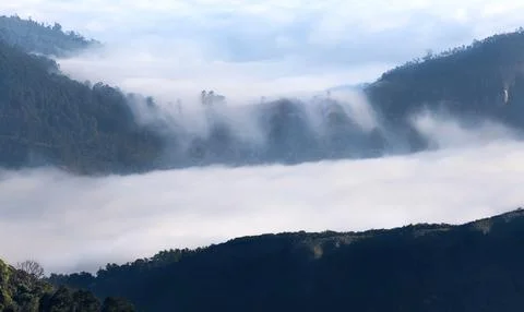 Beautiful misty cloud rainfall, falling down from the high mountain valleys, Stock Photos