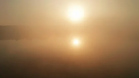 Beautiful misty dawn in the spring on the river. Video stock 121070789