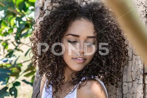 Beautiful model afro american woman in a natural setting. Brazilian young wom Stock Photos