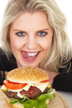Beautiful model with Burger Stock Photos
