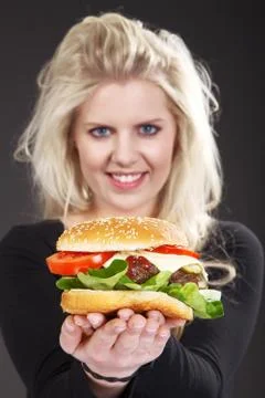 Beautiful model with Burger Stock Photos