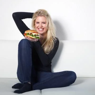 Beautiful model with Burger Stock Photos