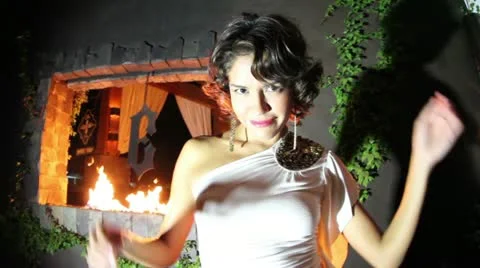 Beautiful model dances and poses fire luxury hotel Stock-Footage 10875716