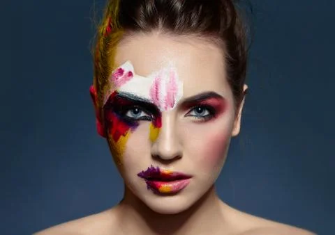 Beautiful model demonstrating creative art makeup Stock Photos