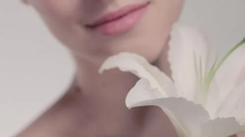 Beautiful model with flower Stock-Footage 49544387