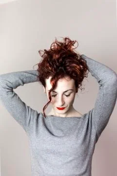 A beautiful model is having fun in the photo studio Stock Photos