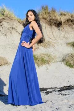 Beautiful model looking down at camera at the beach in Sligo in Ireland. Stock Photos