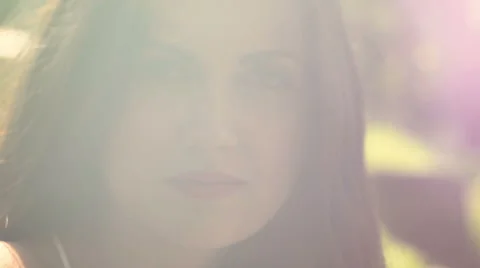 Beautiful model looks at camera slide dream Stock Footage 43765910