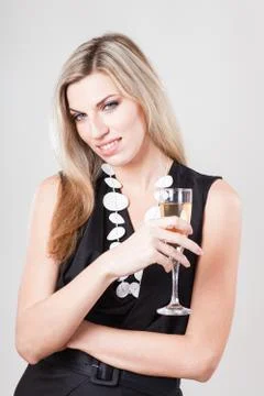 Beautiful model portrait over studio white background hold wine glass Stock Photos