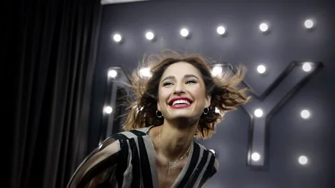 Beautiful model posing for the camera and smiling Stock Footage 144275392