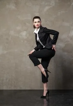 Beautiful model posing on dark grey background . studio photo Foto stock