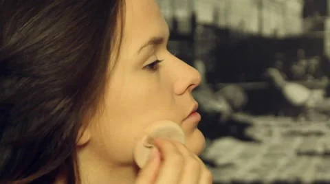 Beautiful model put make up- close up Stock Footage 10054255