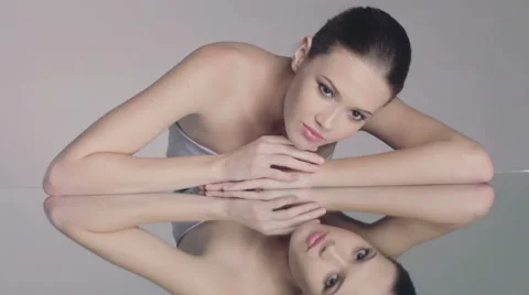 Beautiful model reflected in mirror Stock-Footage 49653226