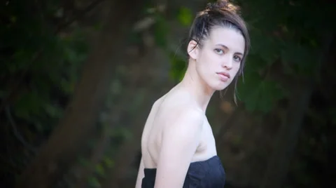 Beautiful model turning into sunlight Stock Footage 34512792