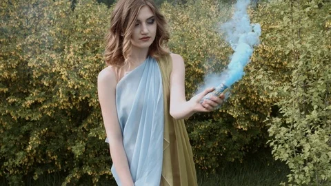 Beautiful model on vacation in the forest. Smoke 库存影片 76295577
