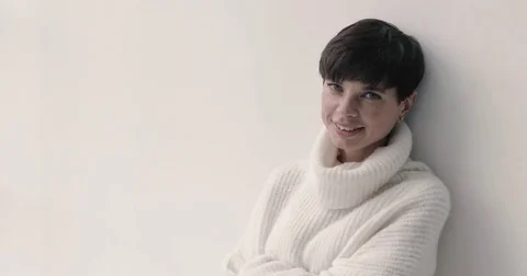 Beautiful model in white sweater Stock Footage 82097865