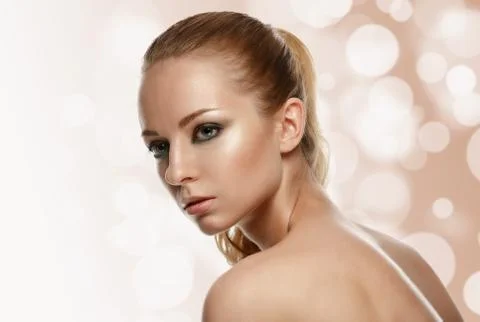 Beautiful model woman face with fashion makeup Stock Photos