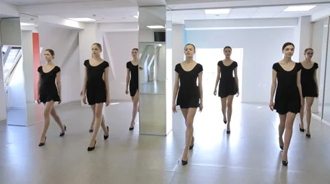 Beautiful models practice in catwalk on group lesson Stock-Footage 66187168
