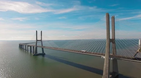 Beautiful modern bridge over the river aerial view Stock Footage 64283095