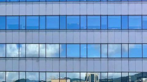 Beautiful modern tall tower with clouds in financial district. Windows skylin Stock Illustration