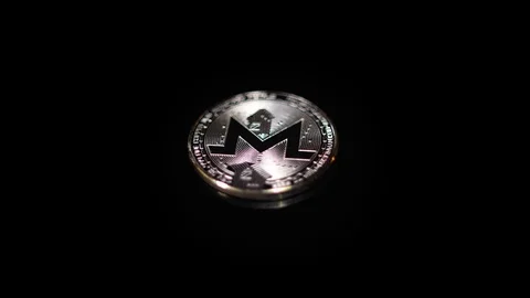 Beautiful Monero cryptocoin and playing light Stock Footage 124907568