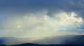 Beautiful morning nature, sunlight gaps in thick fog over mountains, heaven HD Footage