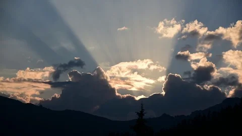 Beautiful Morning Timelapse of Sunrays Shining Through Pink Clouds Switzerland Stock Footage 80604794