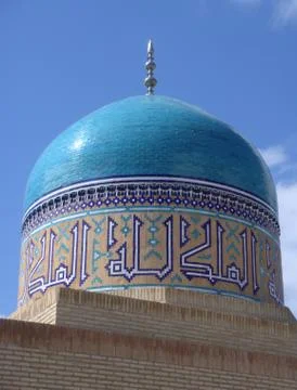 Beautiful mosque tomb in Uzbekistan in sunlight with blue sky Stock Photos