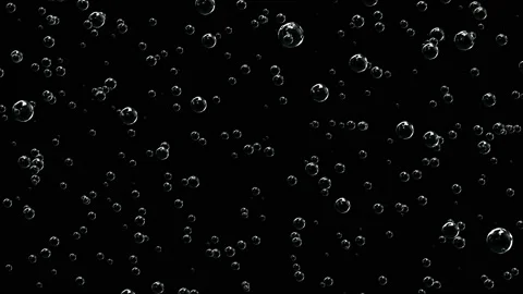 Beautiful motion through the bubbles. Small white particles floating on the Video stock 114798149