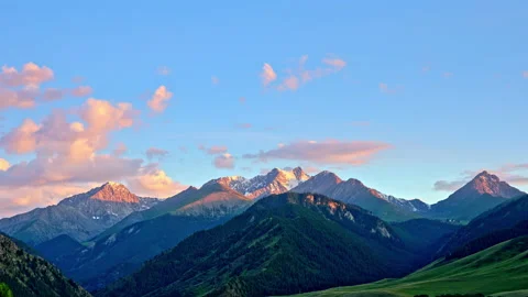 Beautiful mountain and colorful cloud nature scenery in Xinjiang at sunset. Stock Footage 201349429