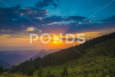 The beautiful mountain on the background of sunset. Wide angle Stock Photos