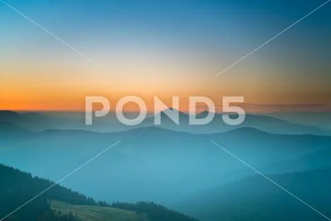 The beautiful mountain on the background of sunset. Wide angle Stock Photos
