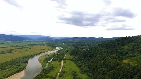 Beautiful mountain ladnscape river mountains, gloome weather Stock Footage