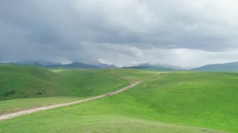 Beautiful mountain landscape with clouds and road Stock Footage 230211715