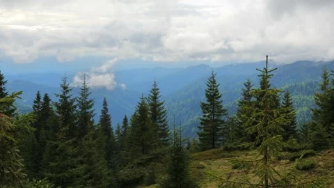 Beautiful Mountain Landscape with Clouds Drifting Over the Peaks Stock Footage 284932170