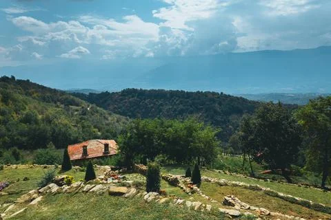 Beautiful mountain landscape featuring a rustic house. Stock-Fotos