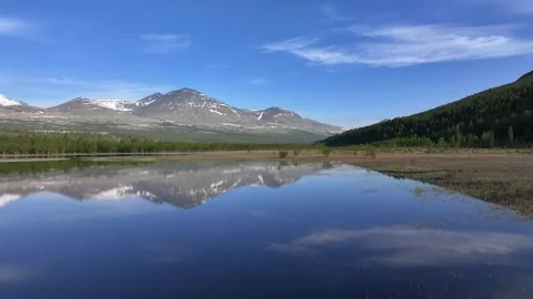 Beautiful mountain landscape with reflection on the lake in Rondane National Par Stock Footage 248049116
