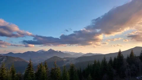 Beautiful mountain landscape at sunset, spring weather, colorful moving clouds Stock-Footage 167839104