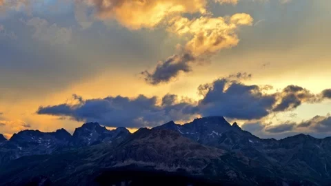 Beautiful Mountain Peak with Clouds in Sunset in St Moritz Stock Footage 284918864