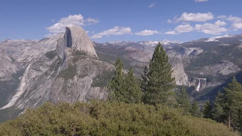 Beautiful mountain range and green forest on a sunny day in Yosemite Valley Stock Footage 99088040