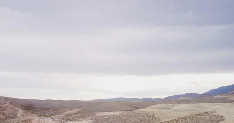 Beautiful mountain range and landscape on a sunny day Stock Footage 101202464