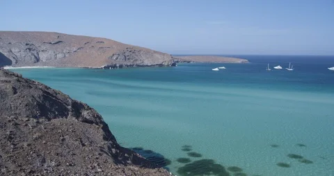 Beautiful mountain range and turquoise sea on a sunny day Stock Footage 85805145