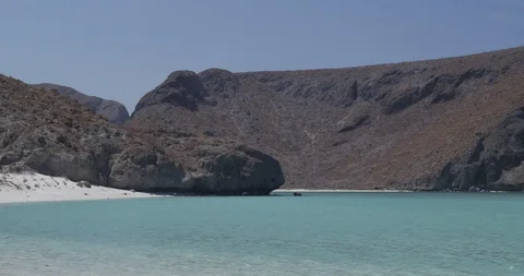 Beautiful mountain range and turquoise sea on a sunny day Stock Footage 85806375