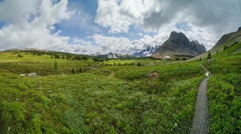 A beautiful mountain range with a clear blue sky Stock Photos