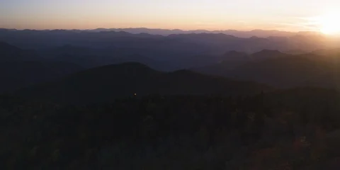 Beautiful mountain range with forest at sunset Stock Footage 103401470