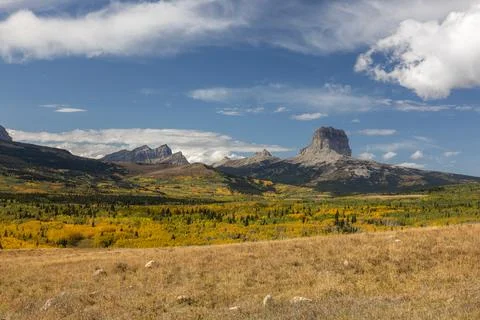 A beautiful mountain range with a large mountain in the middle Stock Photos