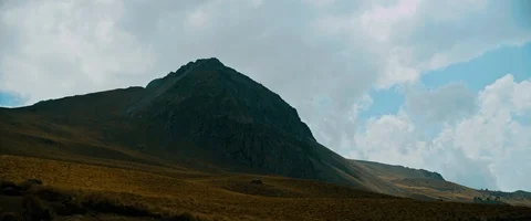 Beautiful mountain ranges and clouds on a sunny day Stock Footage 85807267