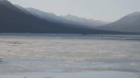Beautiful mountain ranges behind the flowing river Stock Footage 145276164