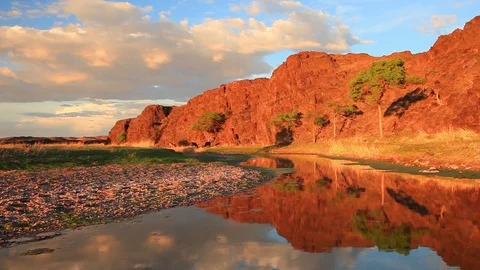 Beautiful mountain river in the canyon at sunset Stock Footage 80459057