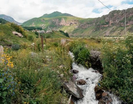 Beautiful mountain river falling Stock Photos